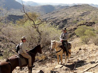 On horses in Khomas Hochland mountains, Namibia