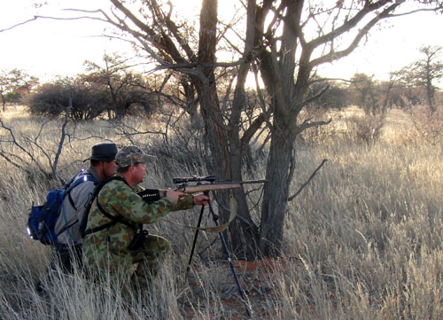 Michael with Adam... ready to shoot on shooting sticks Kalahari Hunting Namibia