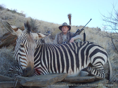 Victor with his Hartmann's Zebra hunted in the Khomas Hochland mountains of Namibia Hartmann's Zebra Hunt Namibia
