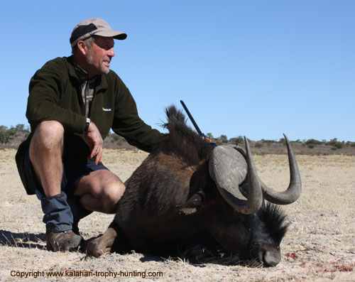 John with his magnificent Black Wildebeest Namibia Black Wildebeest Hunt