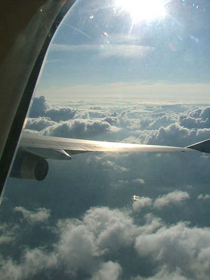 Air Travel to Africa above clouds